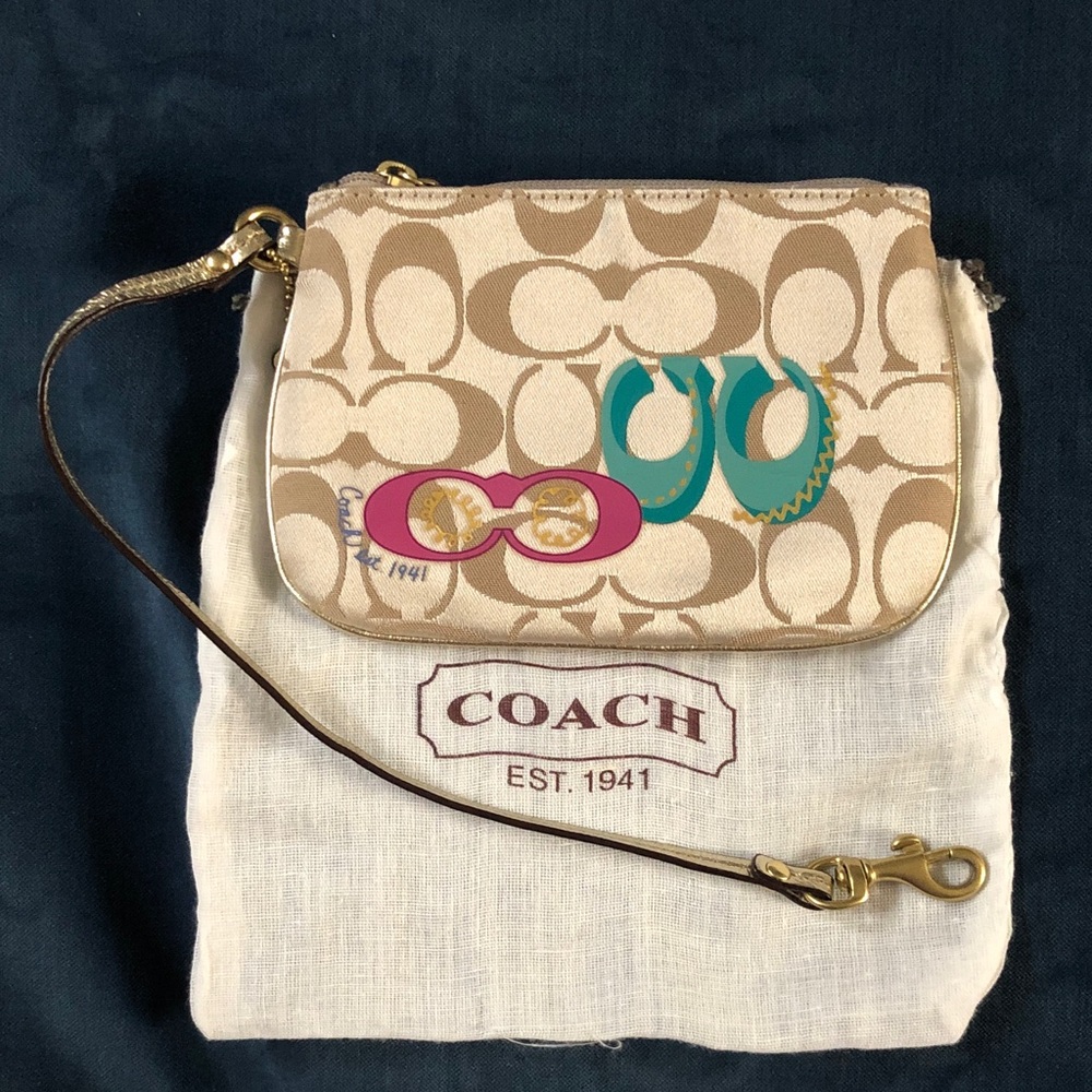 Coach Beige and Pink Wristlet with Teal Accents